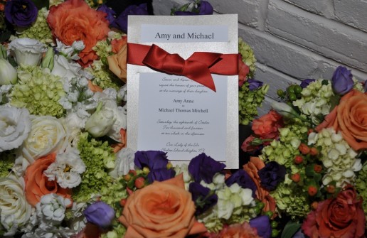 The invitation adorned in flowers